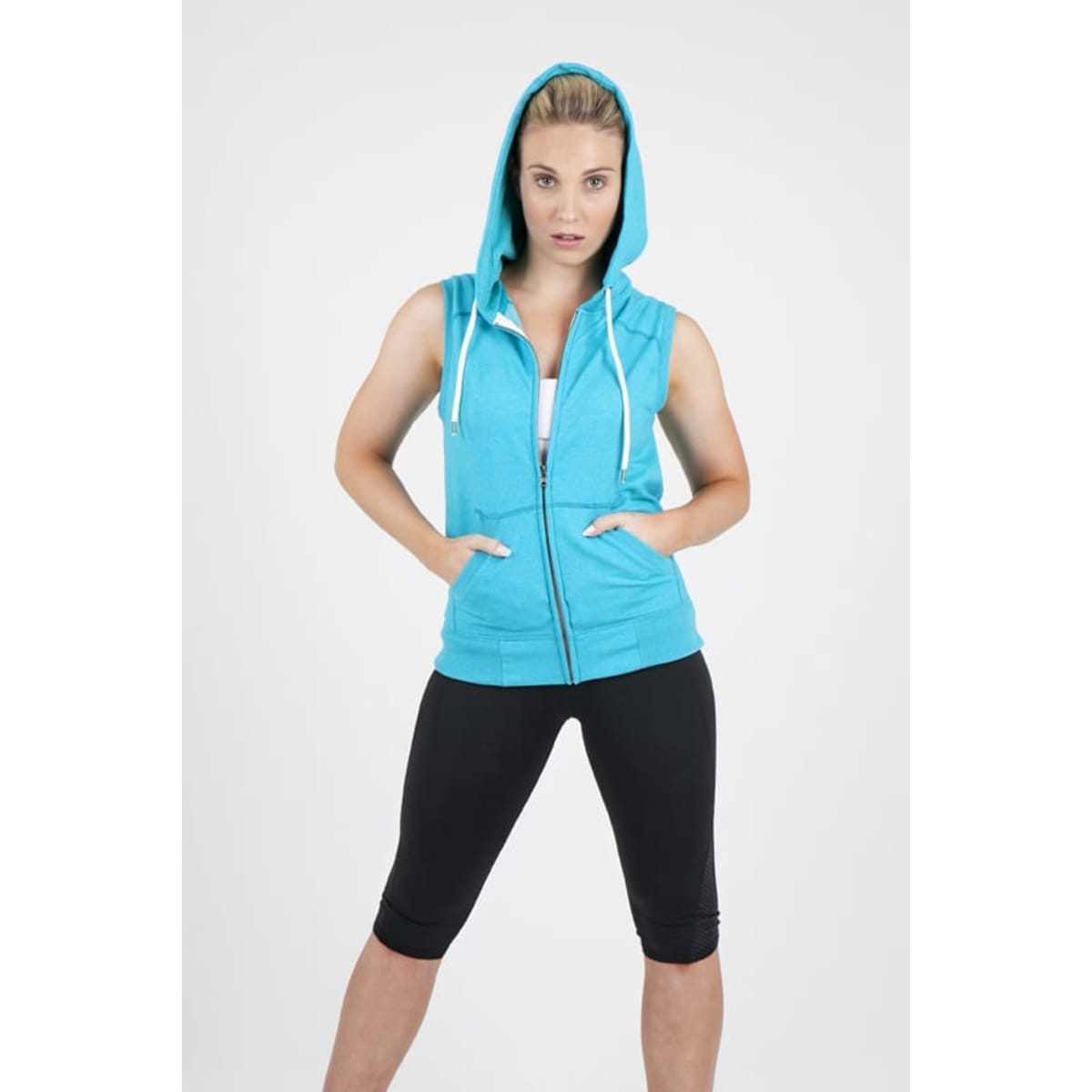 A sleeveless zip hoodie in vibrant turquoise with a hood, featuring front pockets and a model wearing it.