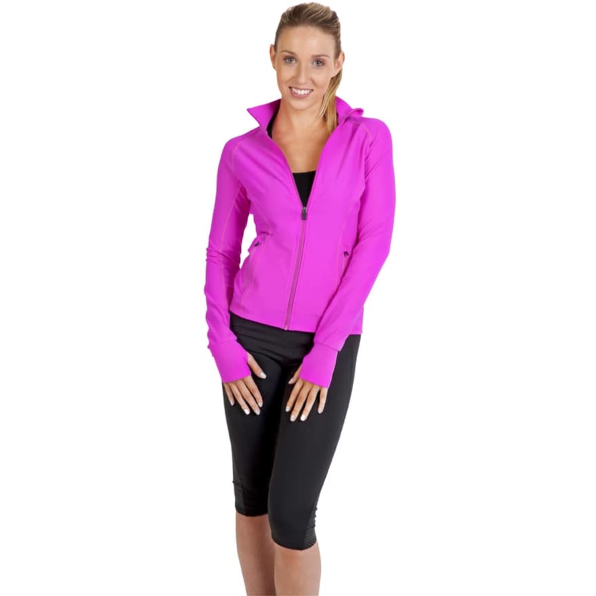 A woman wearing a bright pink nylon/spandex jacket with a zip and long sleeves, styled with black leggings.
