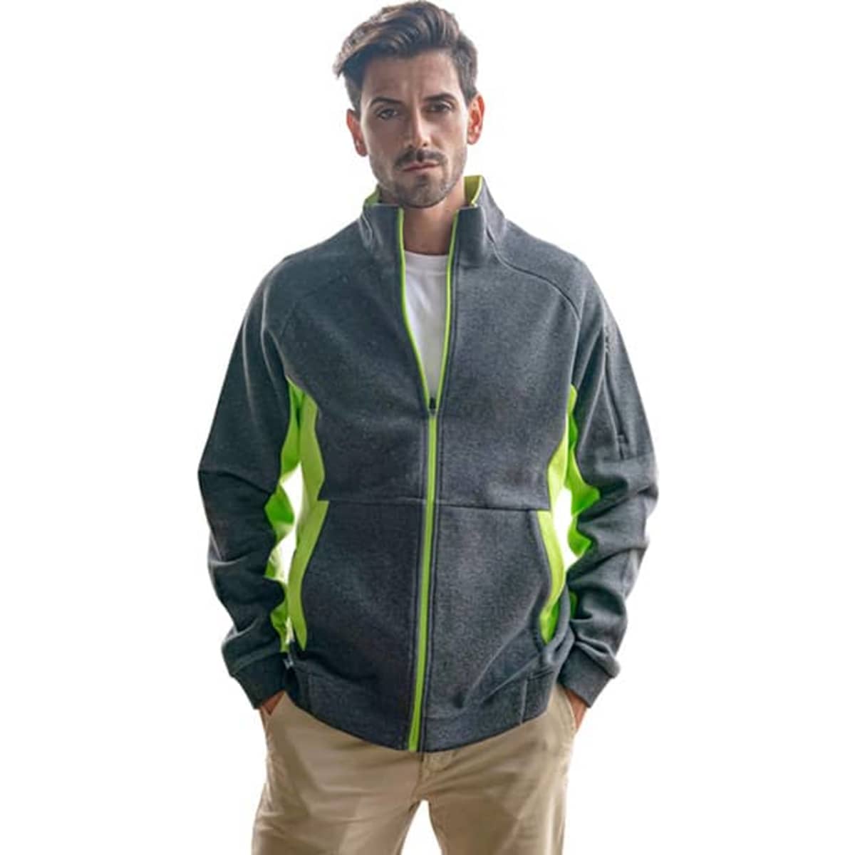 A man wearing a grey jacket with bright green accents, featuring a zip front and standing with hands in pockets.