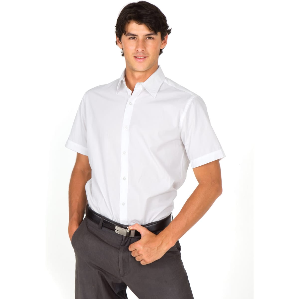 A short-sleeve button-up shirt in white, modelled by a man with dark hair, wearing grey trousers. The shirt features a logo.
