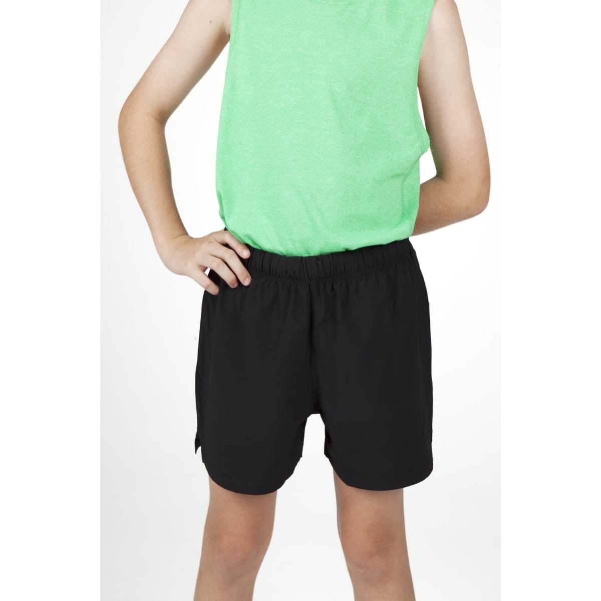 Kids' FLEX shorts in black, featuring a comfortable elastic waistband, paired with a green sleeveless top.
