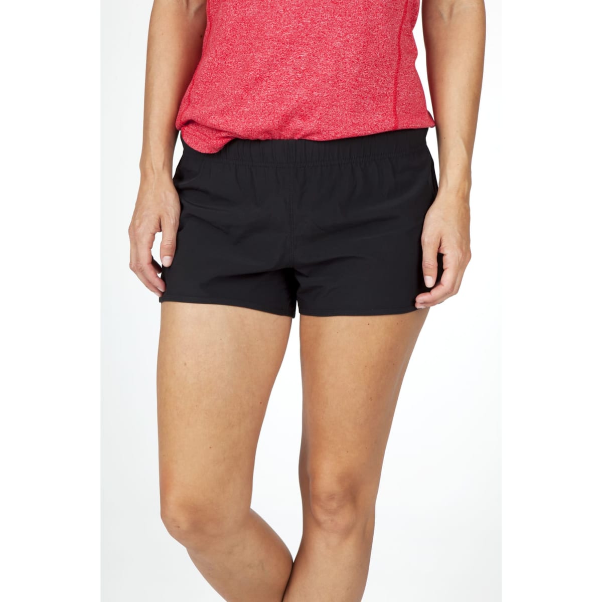 Black women's FLEX shorts featuring a 4-way stretch design, paired with a red top. The shorts have an elastic waistband.
