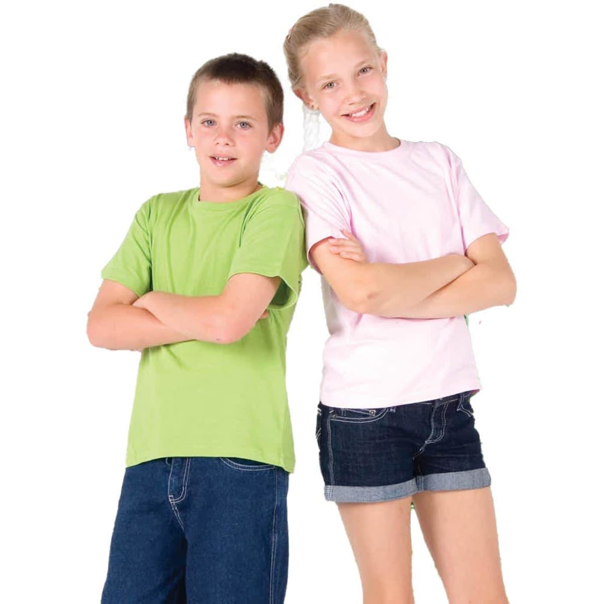 Two children stand side by side, one wearing a green T-shirt and the other in a pink T-shirt, both smiling.