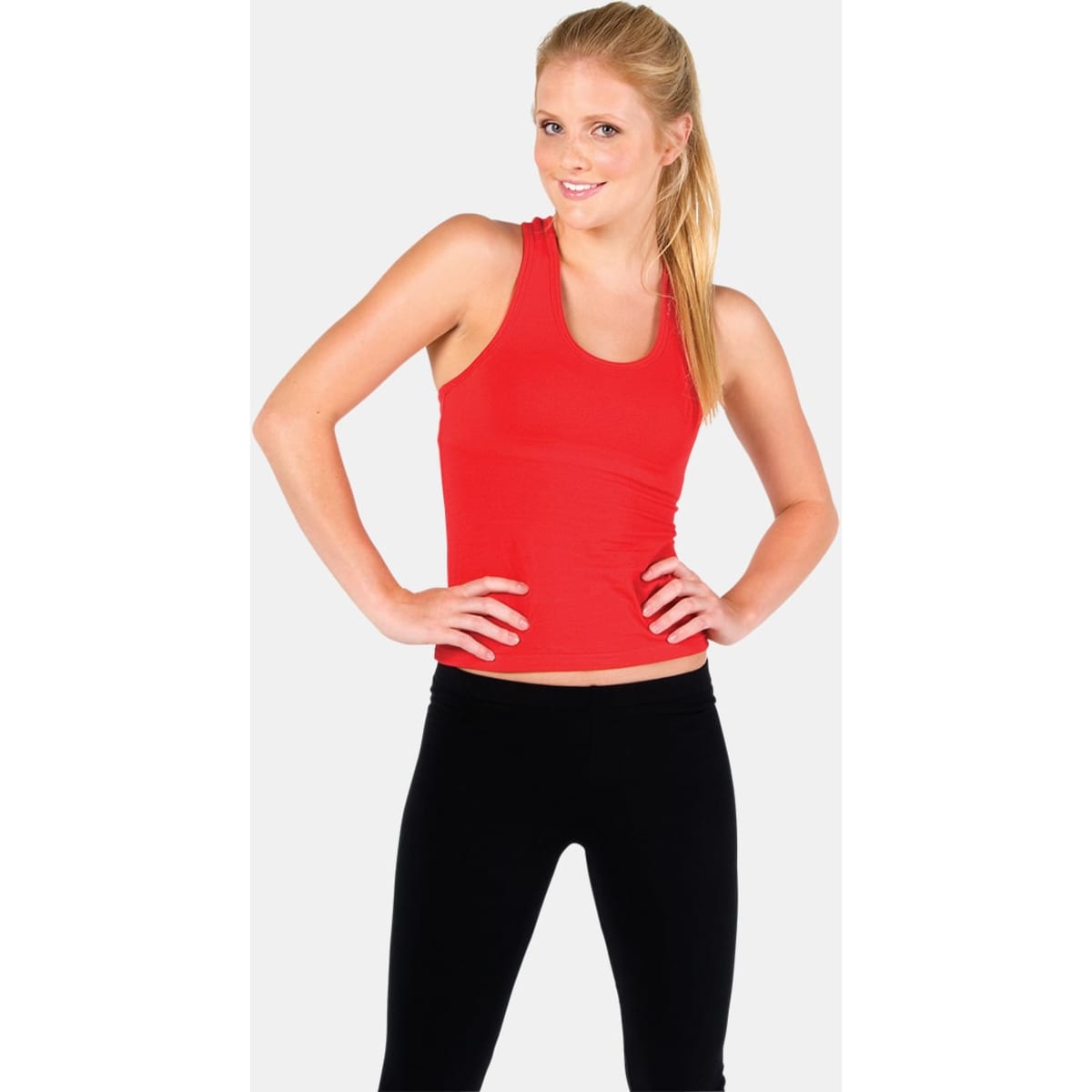 A red women's singlet featuring a fitted design, paired with black leggings. The garment has a logo.