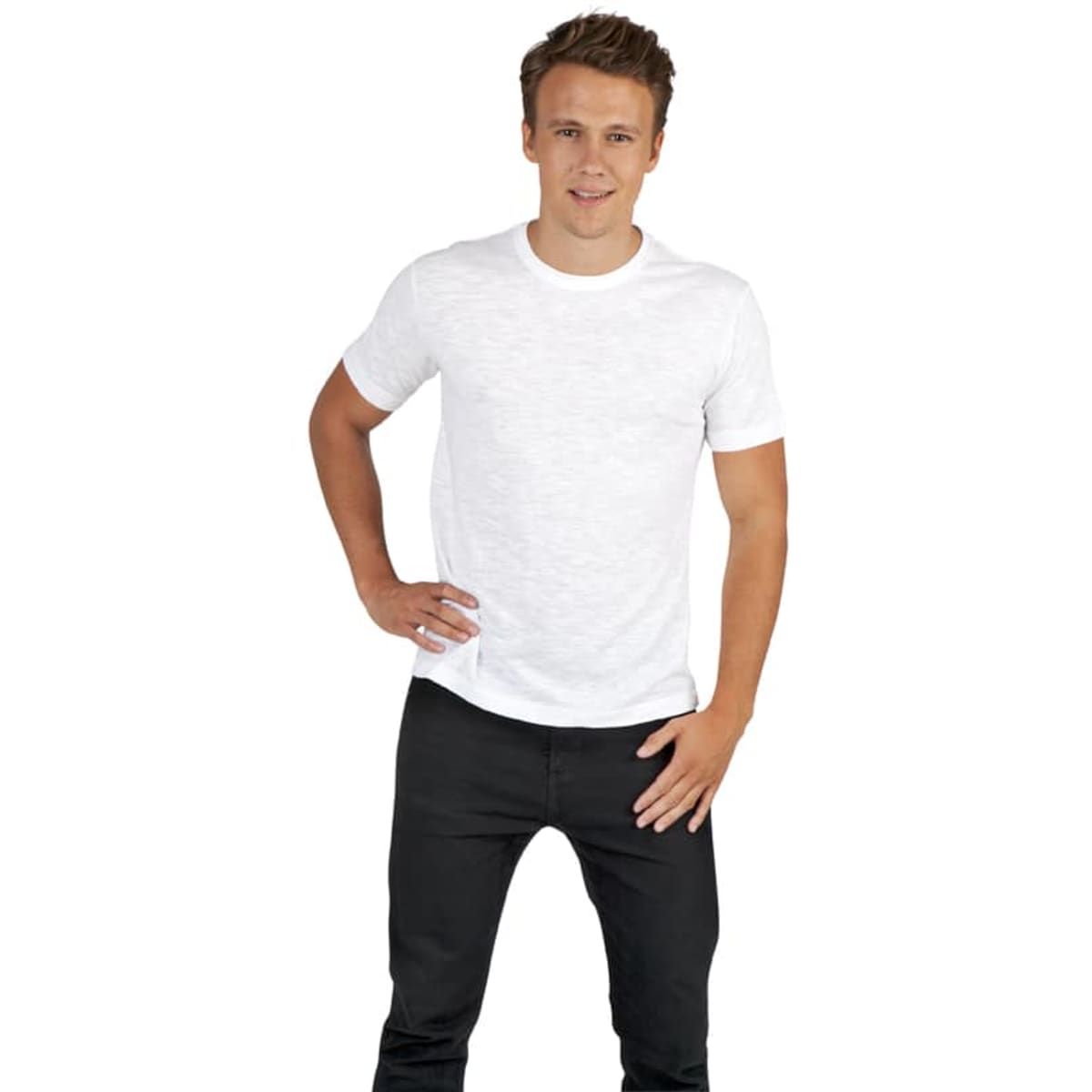 A man wearing a white raw cotton wave t-shirt, standing casually with one hand on his hip.