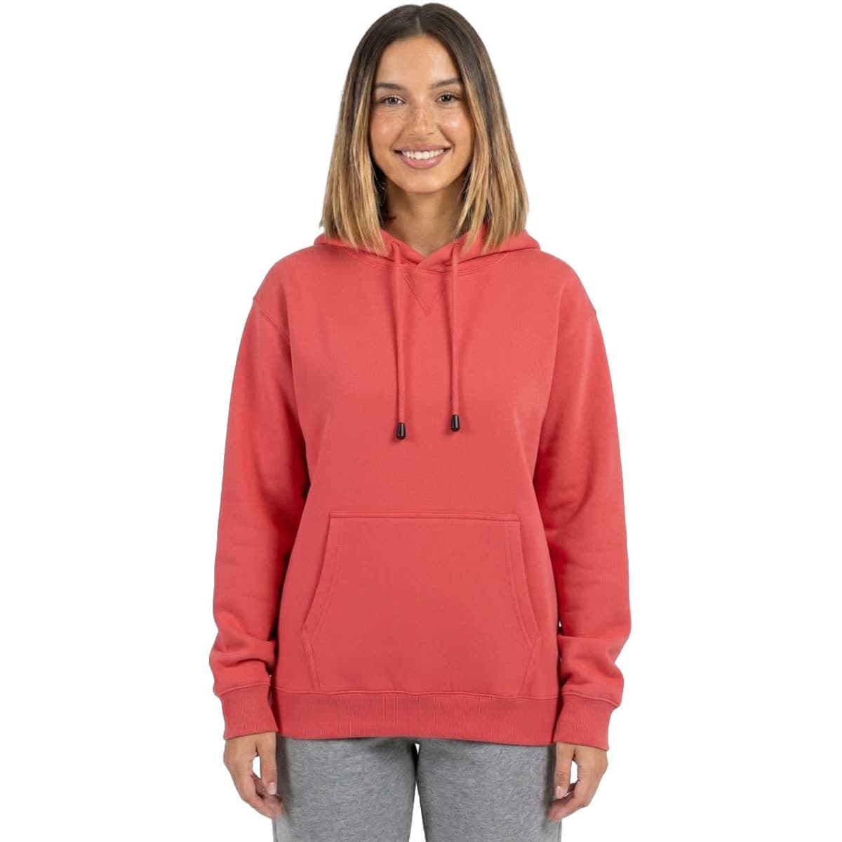 A blue women's junior kangaroo pocket hoodie with a front pocket and drawstring hood, worn by a smiling model.