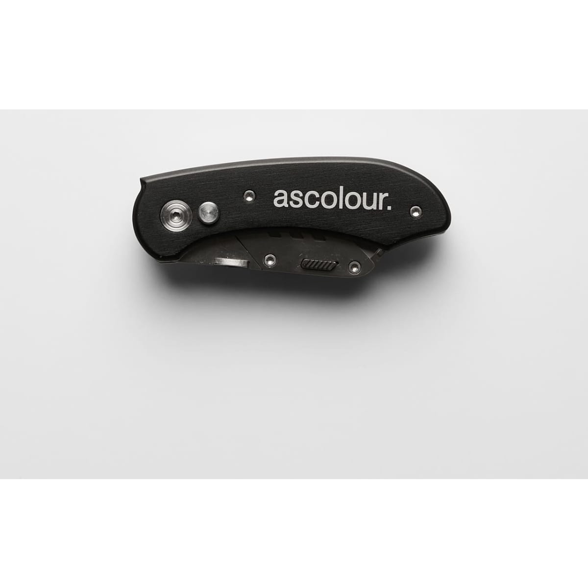 A black ASC Utility Knife with a sleek design, featuring a foldable blade and a logo on the surface.