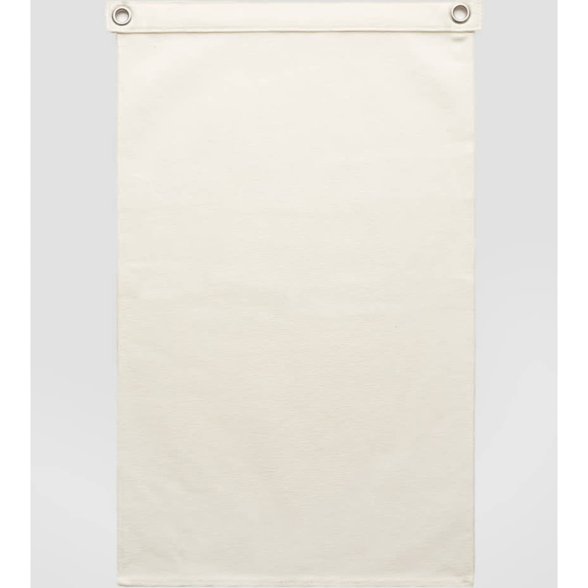 A cream-coloured canvas flag with metal eyelets for hanging. Features a plain design without any text or images.