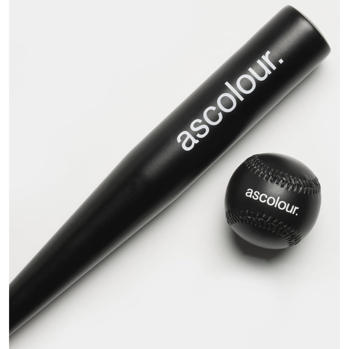 A black baseball bat and a matching baseball, both featuring a logo.