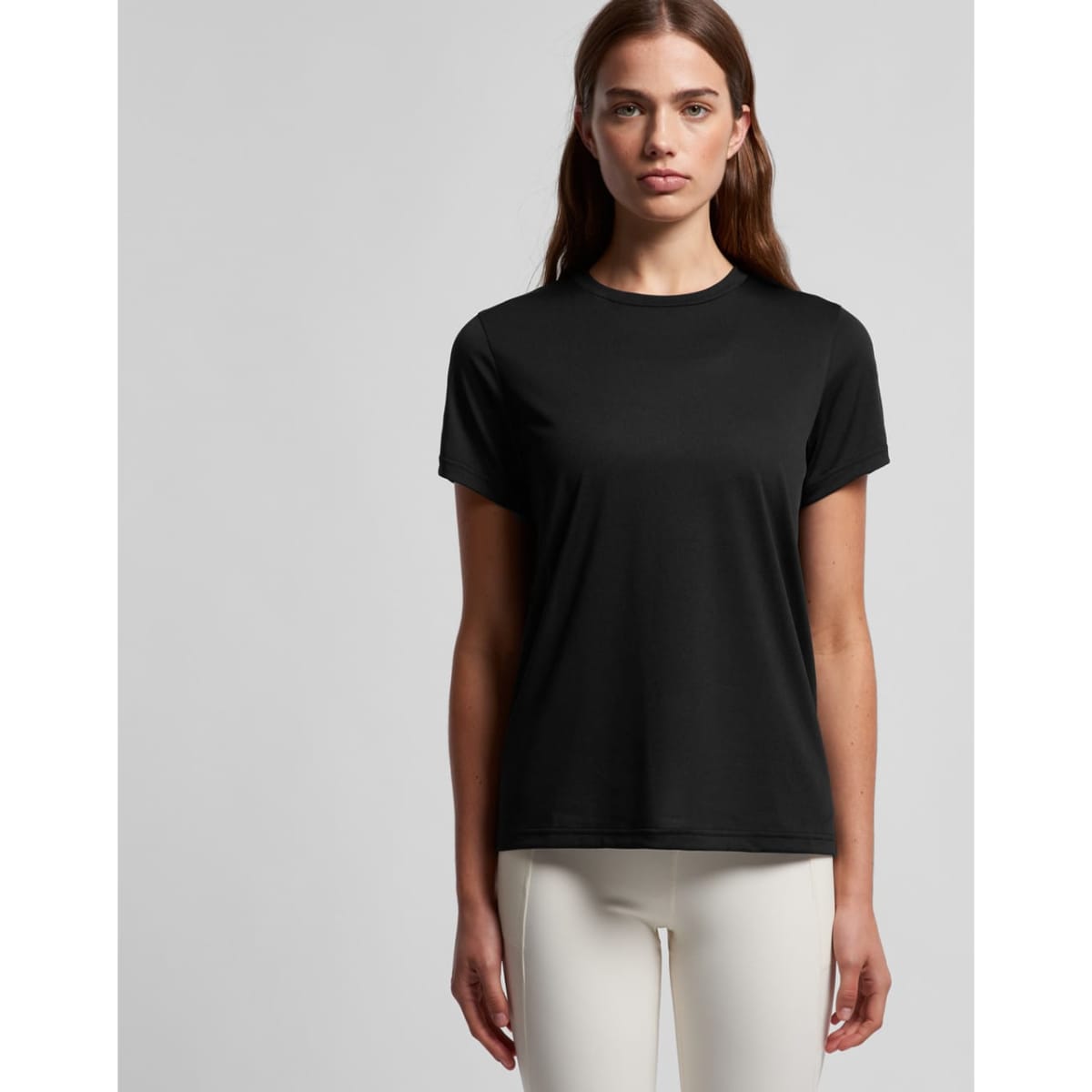 A black active t-shirt featuring a simple design and a logo. Suitable for casual or athletic wear.