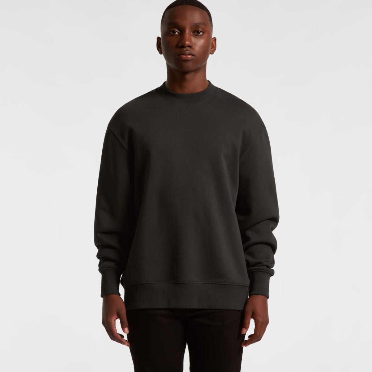 A dark green jumper with long sleeves and a round neckline, featuring a simple design. It has a logo on the front.