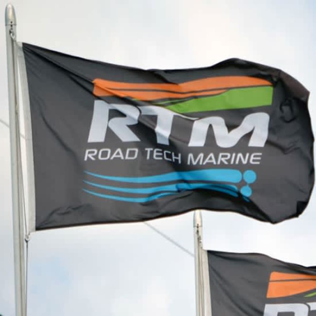 A single-sided custom printed flag, 180cm x 90cm, featuring a dark background with a logo and vibrant accents.