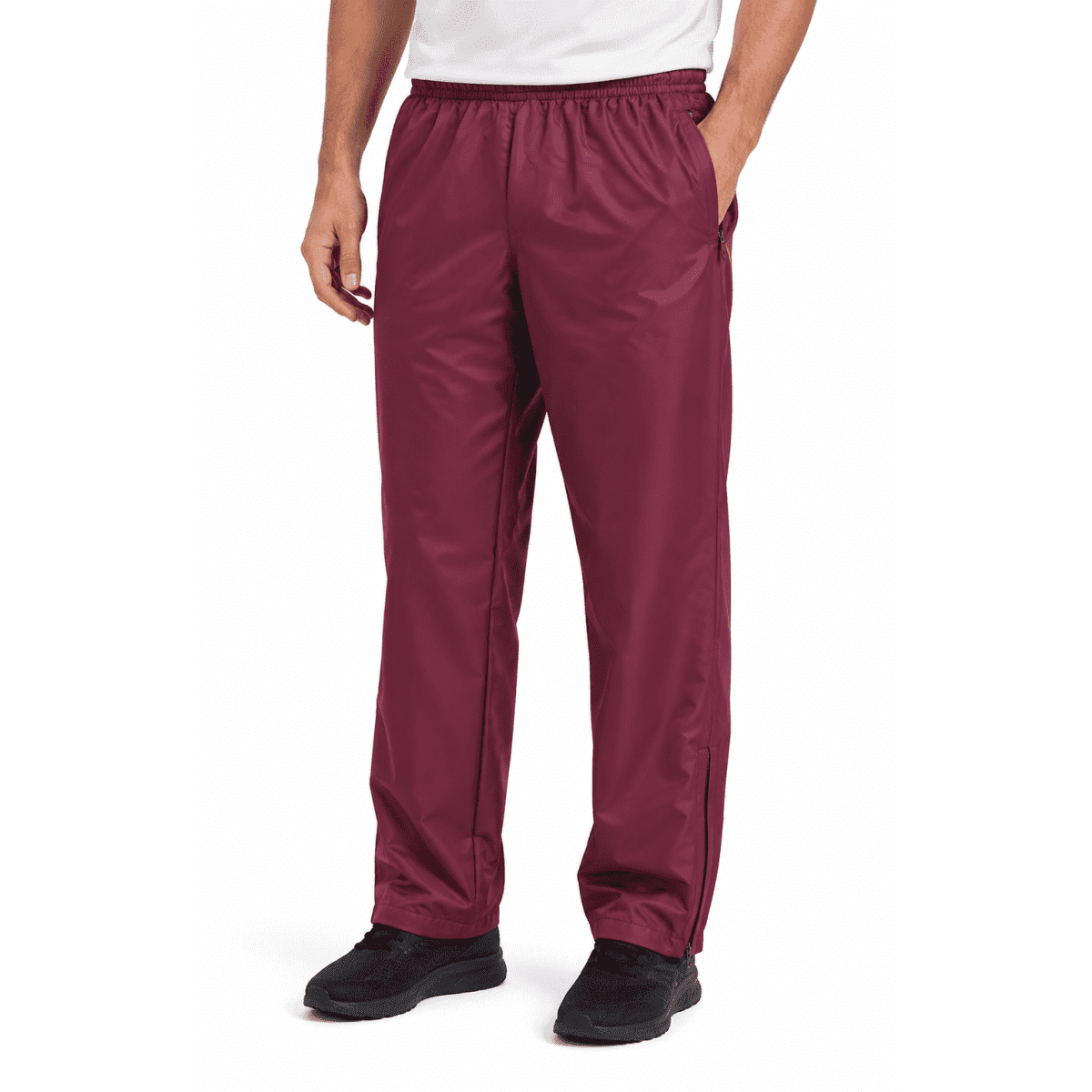 Men's track pants in burgundy, featuring an elastic waistband and side pockets. The design includes a logo on the leg.