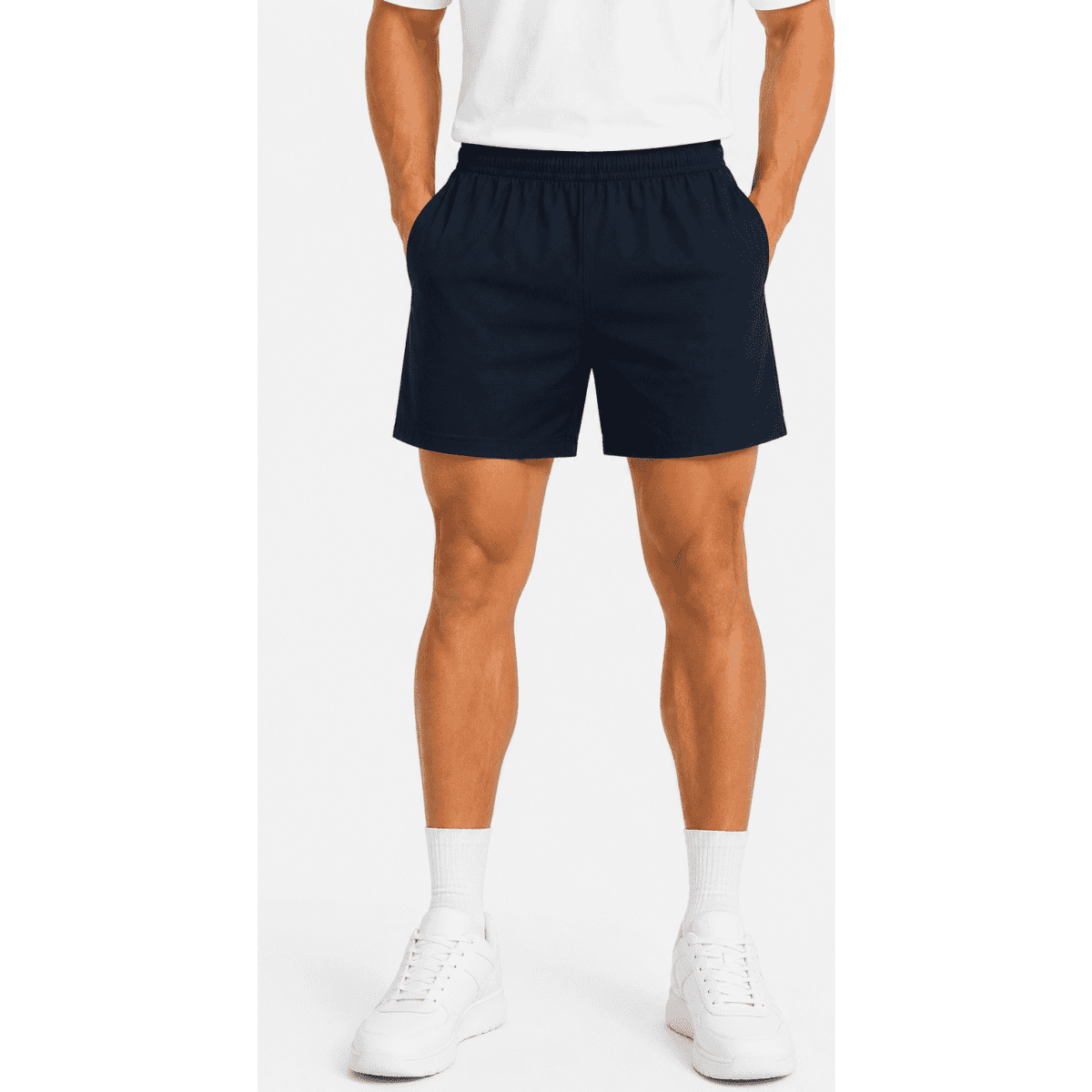 Men's sports shorts in navy blue, featuring an elastic waistband and side pockets. The model is wearing white shoes and socks.