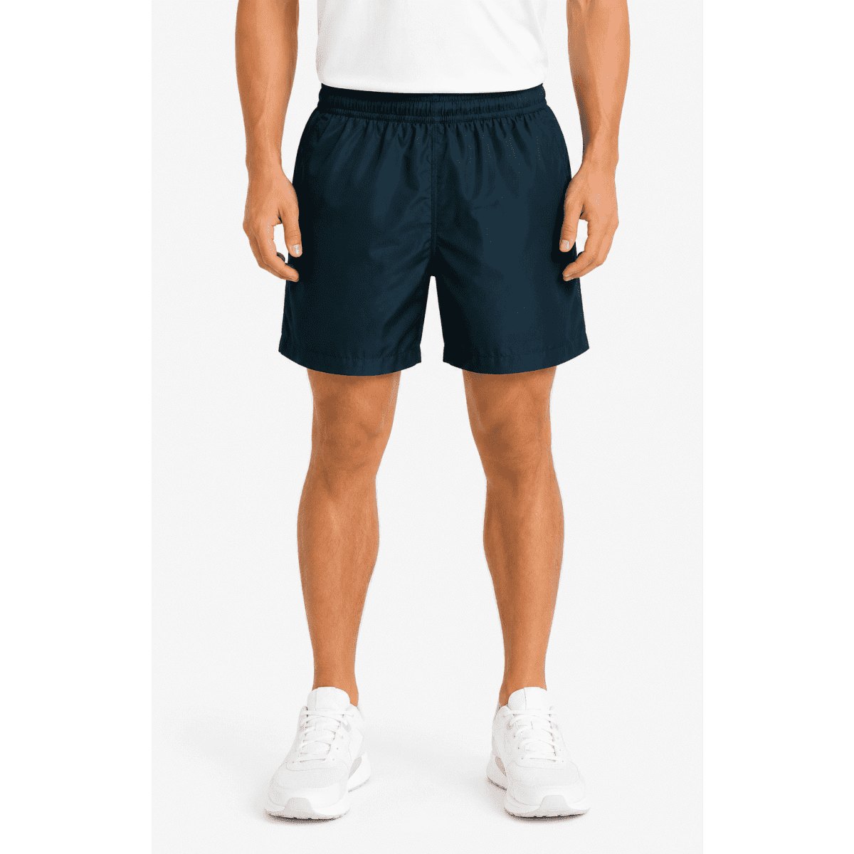 Navy blue men's sports shorts with an elastic waistband, featuring a logo, paired with white sports shoes.