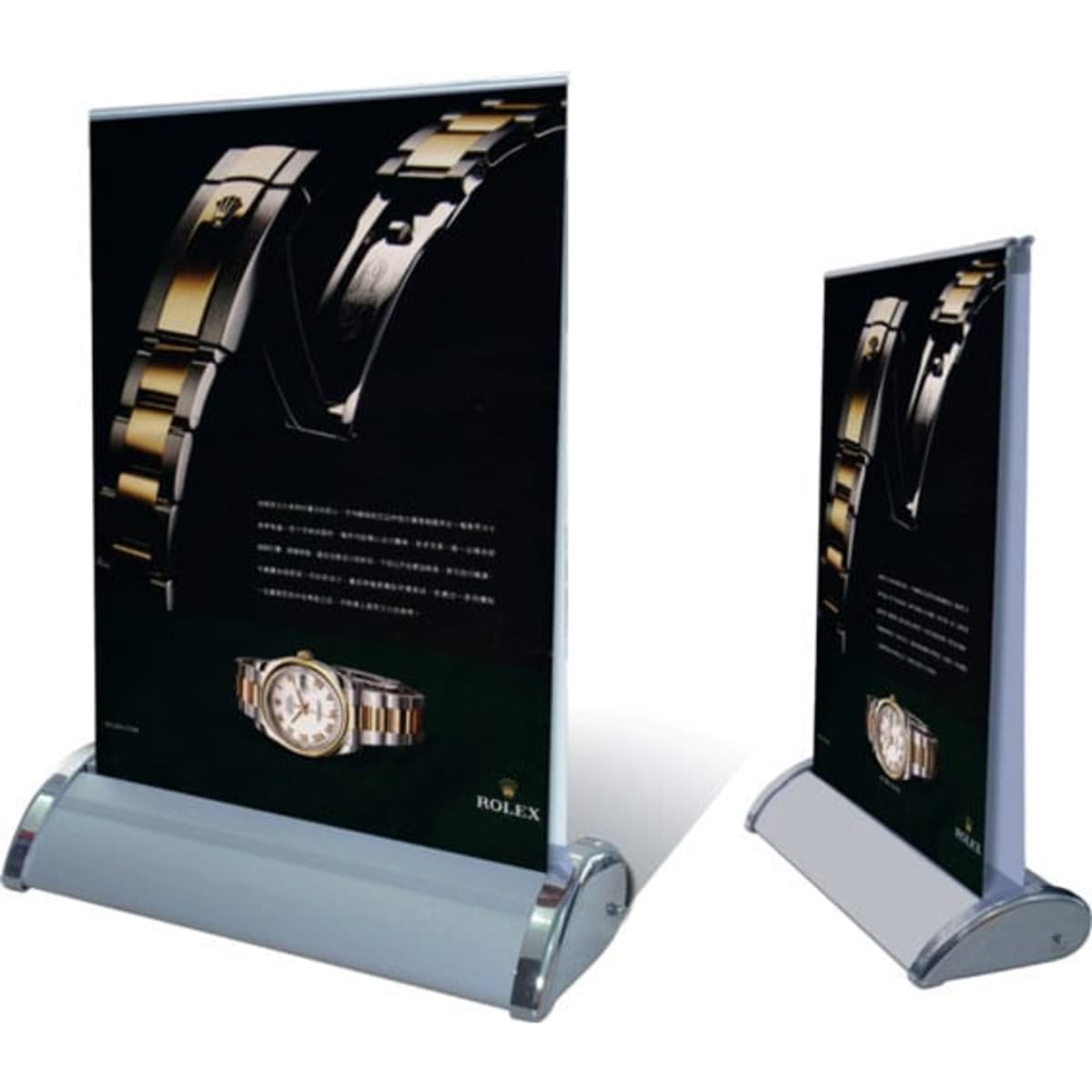 A double-sided pull-up banner featuring a black background and a gold and silver design, with a logo.