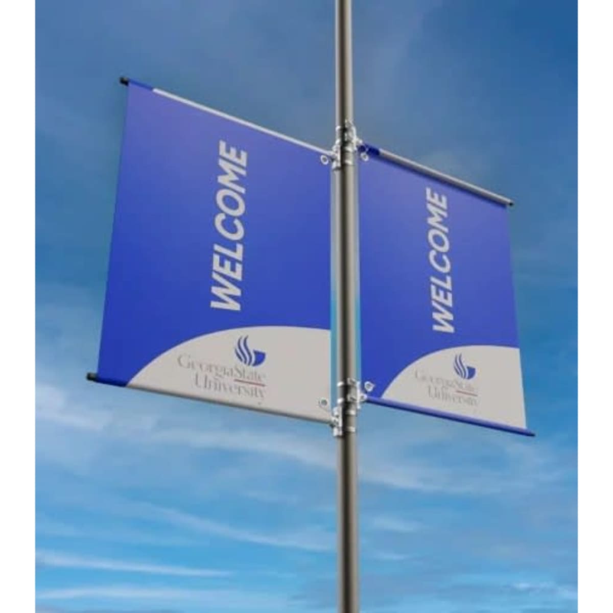Light pole banners in blue and white with a logo, displaying a "Welcome" message against a blue sky.