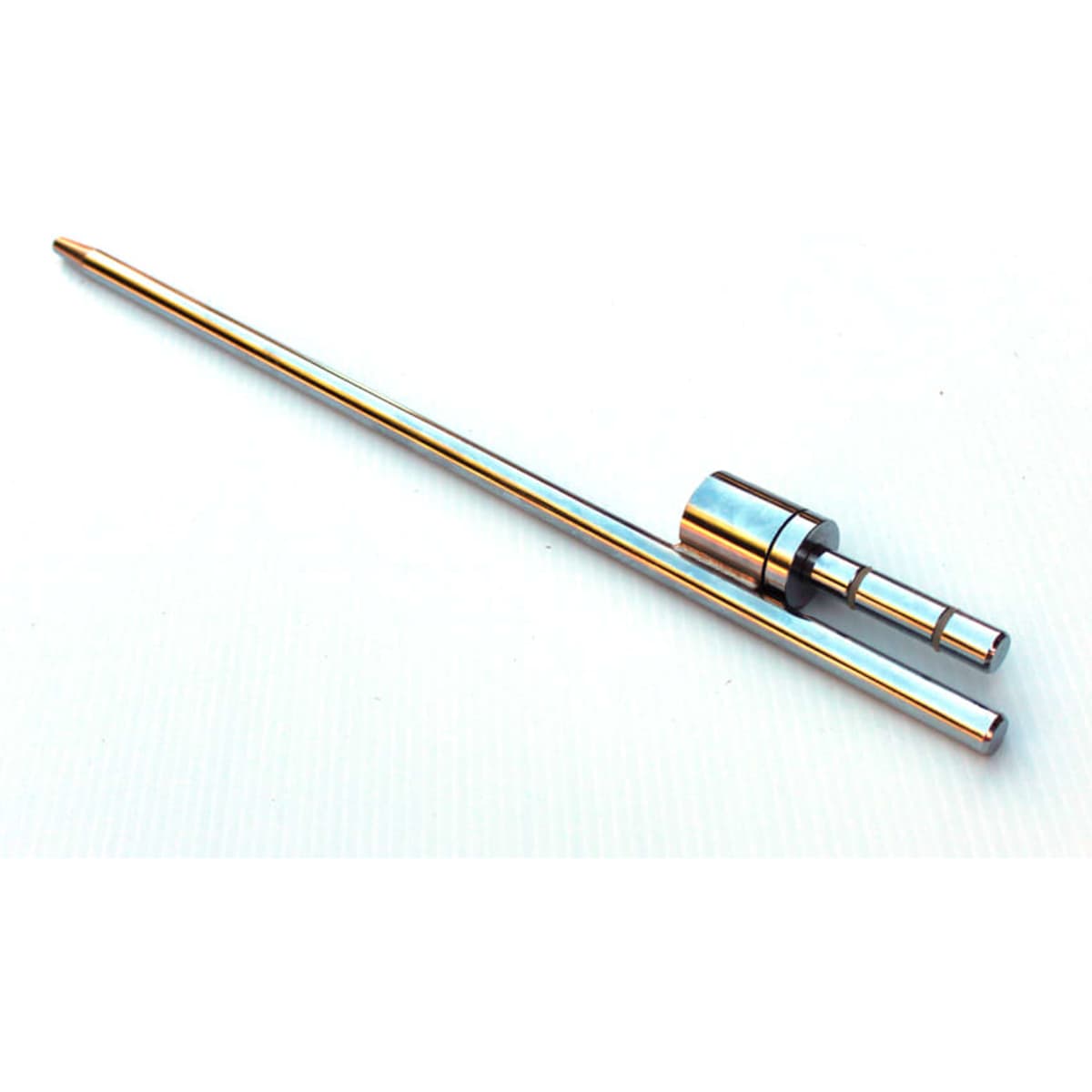 A spiky base product featuring a metallic design with a long, slender shape. It has a smooth, shiny finish.