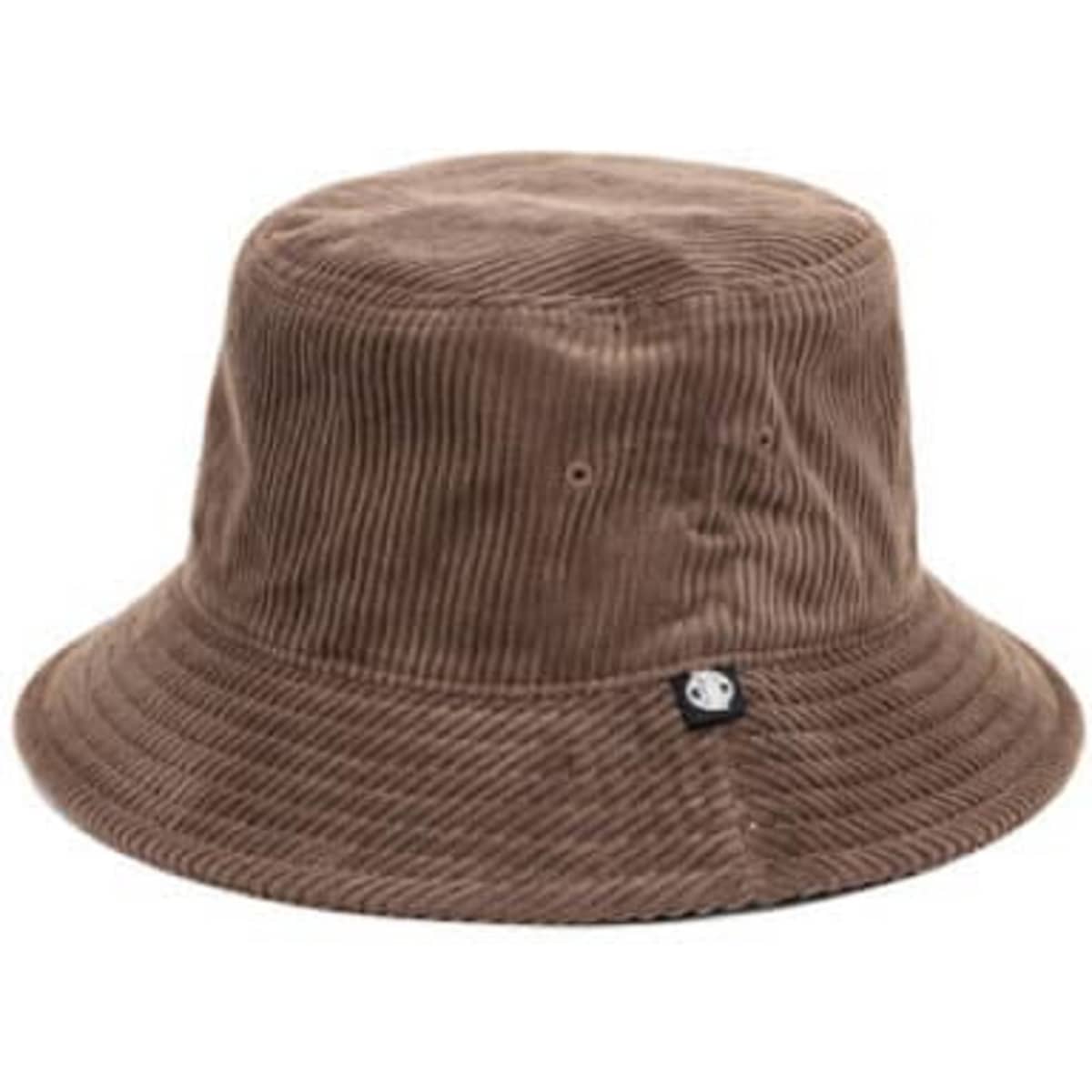 A brown cord bucket hat featuring a small logo on the side. The hat has a wide brim and a textured surface.