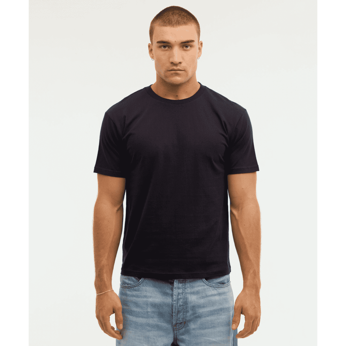 A navy blue t-shirt with short sleeves and a solid design, featuring a simple branding logo on the front.