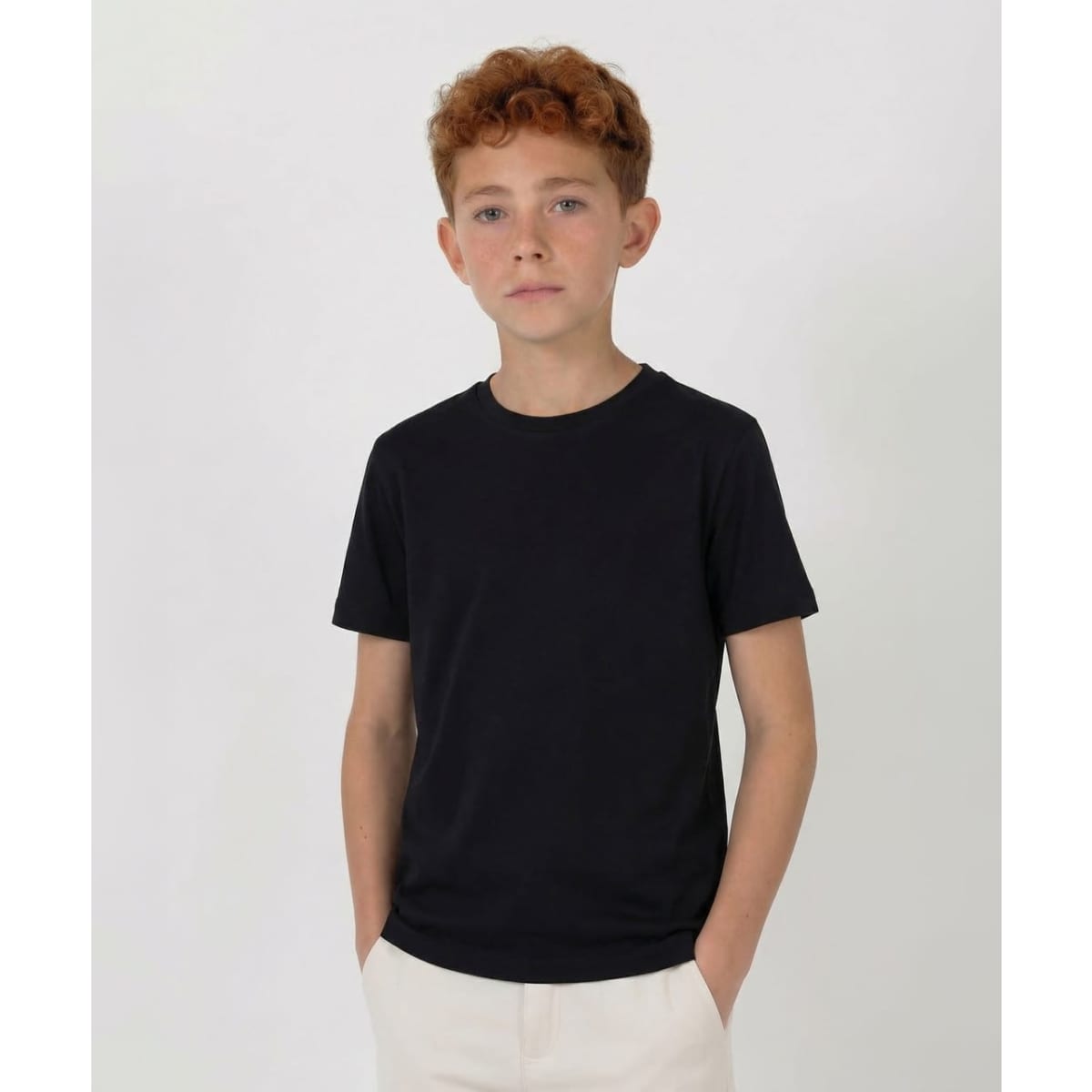 A youth black core tee, featuring a classic design with short sleeves and a round neck.