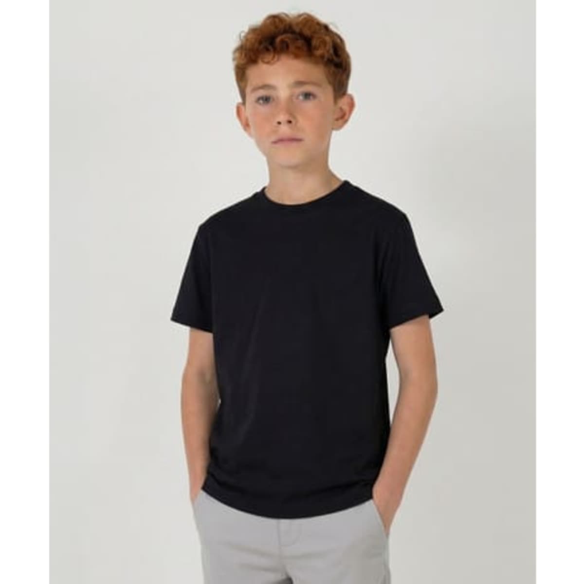 A youth black T-shirt with a classic fit, featuring a simple design and a logo.