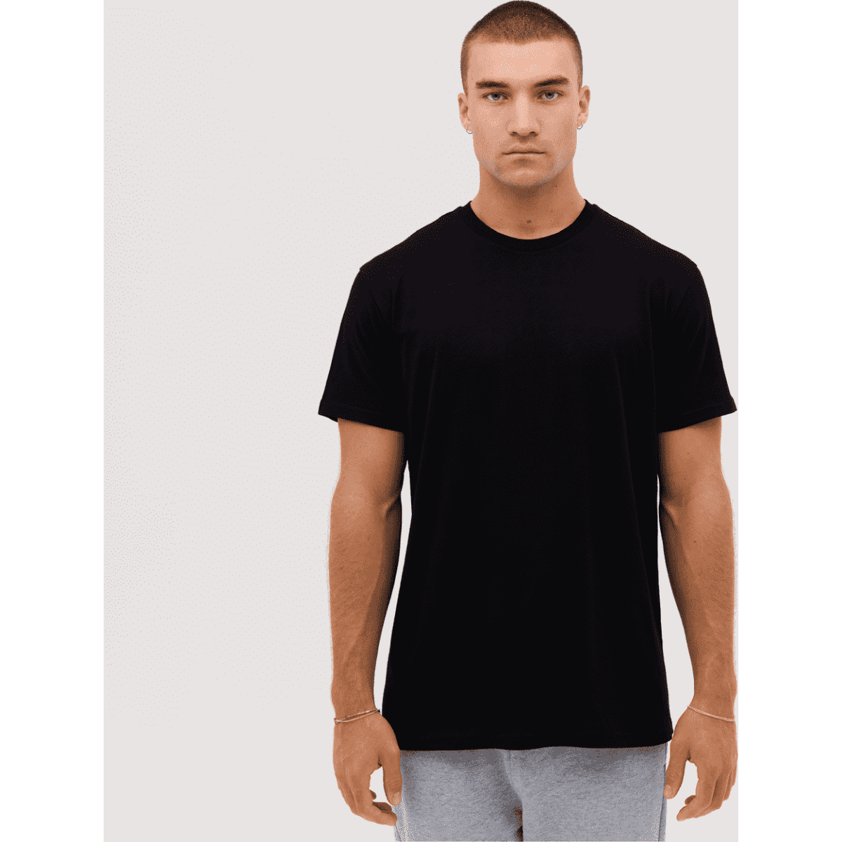 A black t-shirt from the "Yard - Legend Tee" collection. Features a simple design and a logo.