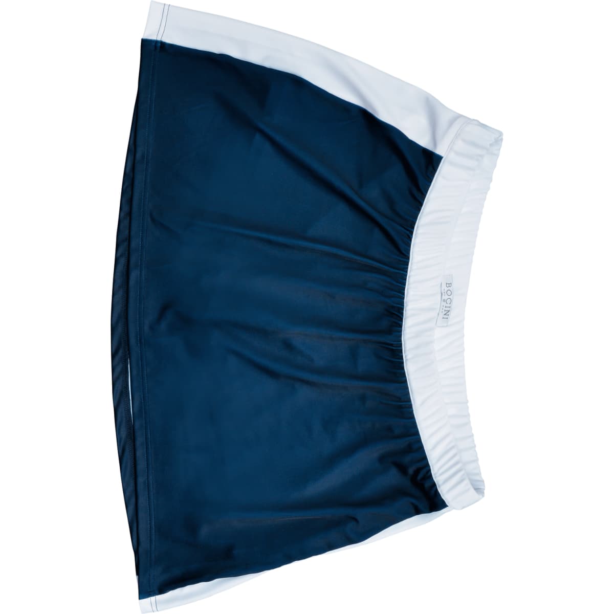 A navy and white ladies sports skort with an elastic waistband and a branded logo.