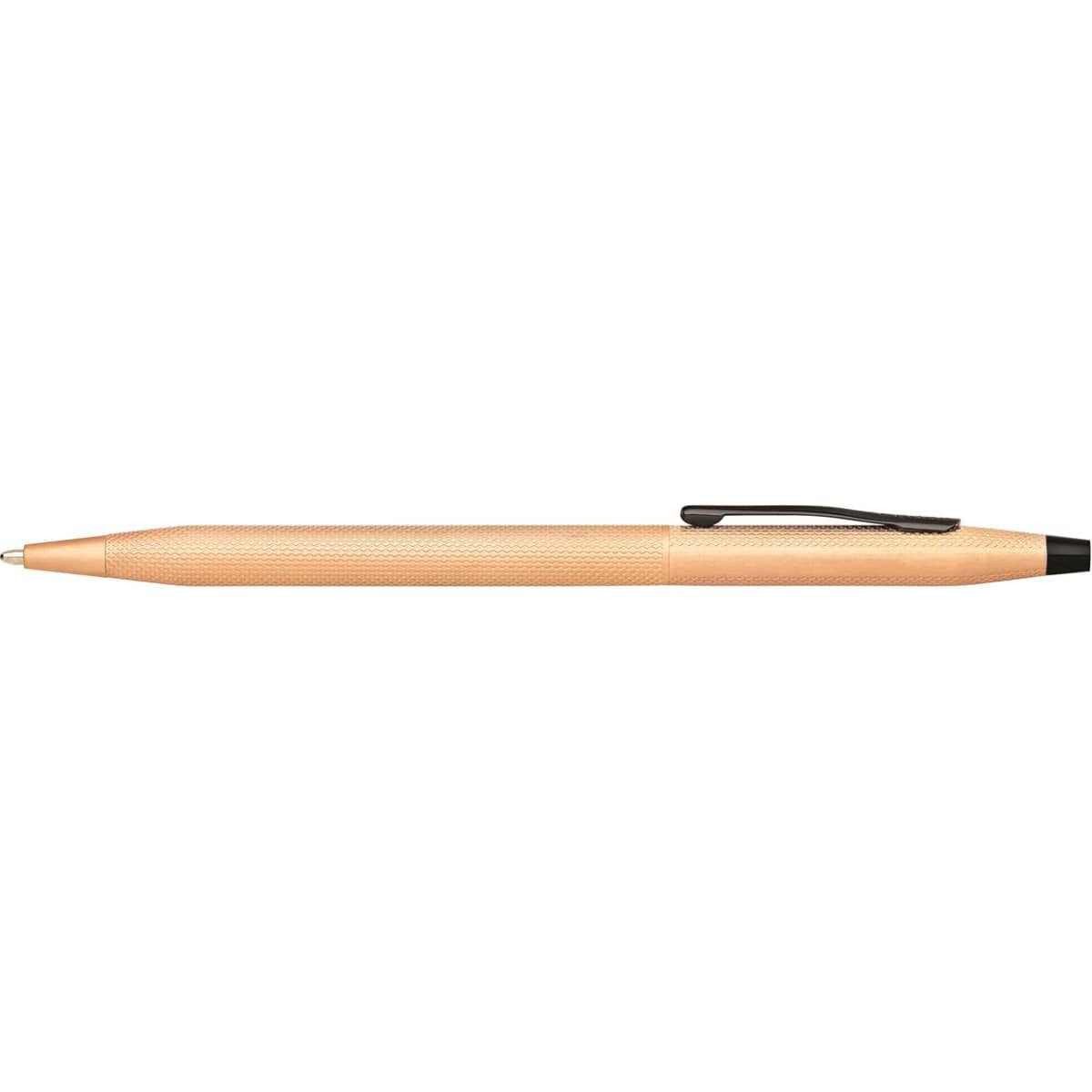 A sleek brushed rose gold pen with a textured grip and a black clip. Features a logo on the side.