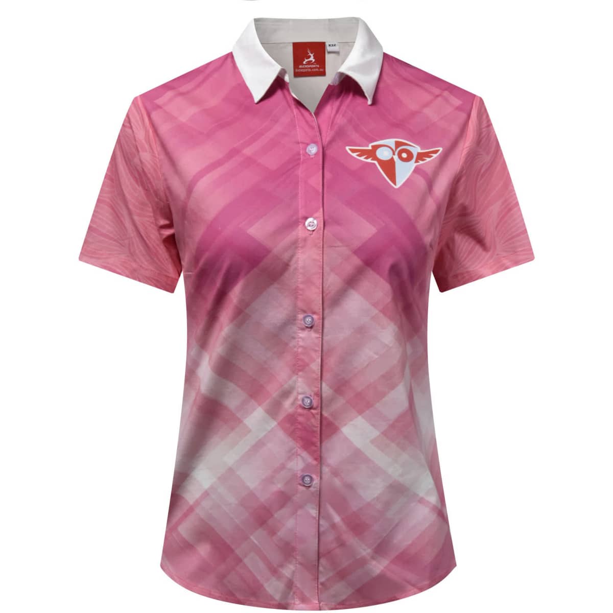 A short-sleeved blouse in shades of pink with a white collar and a logo. The fabric features a patterned design.