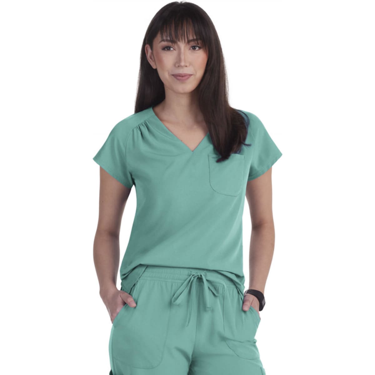 A top in teal with short sleeves and a pocket, featuring a v-neck design and a logo.