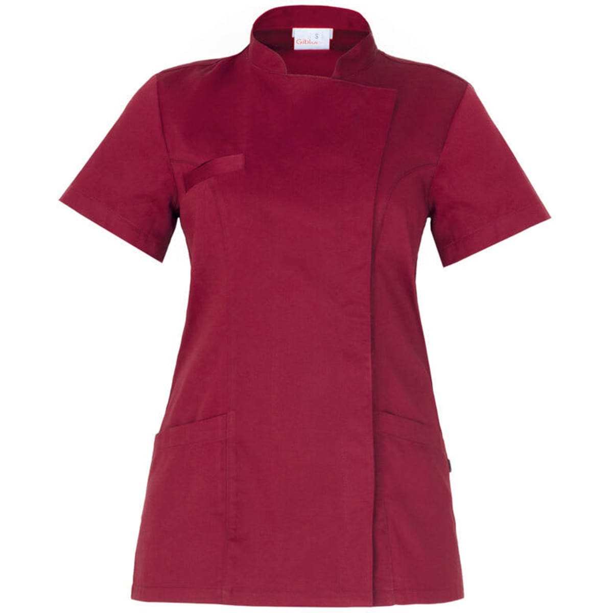 A short-sleeved tunic in a deep burgundy colour featuring a mock wrap design and two front pockets.