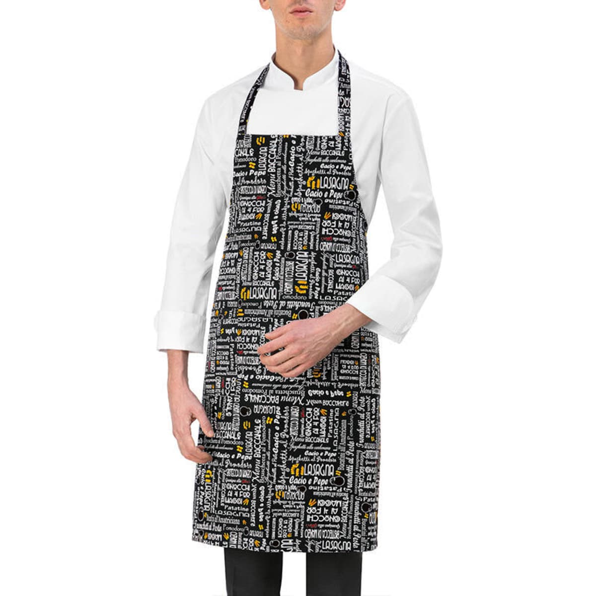 A black apron featuring various white and yellow text designs, worn by a person in a white chef's jacket.