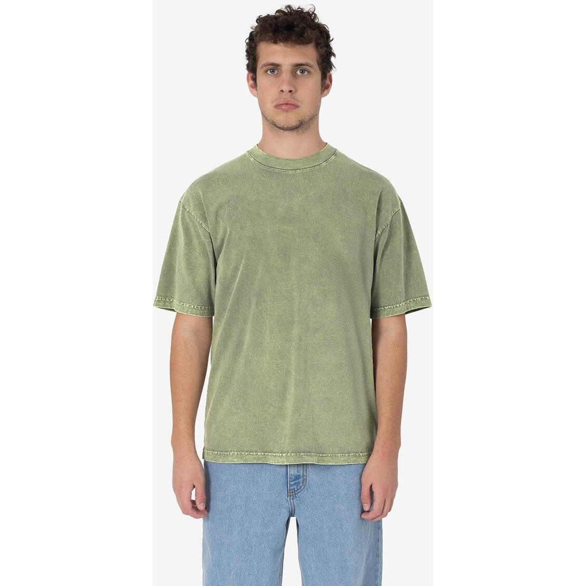 A short sleeve crew tee in a mineral wash green, featuring a relaxed fit and visible stitching details.