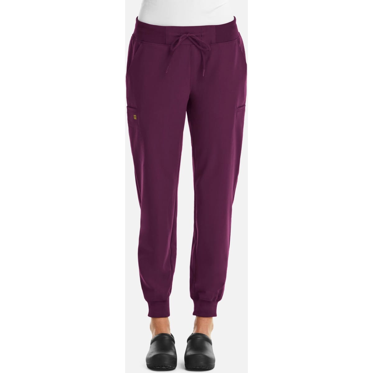 A pair of women's joggers in a rich plum colour with an elastic waistband and pockets. The joggers have a logo.