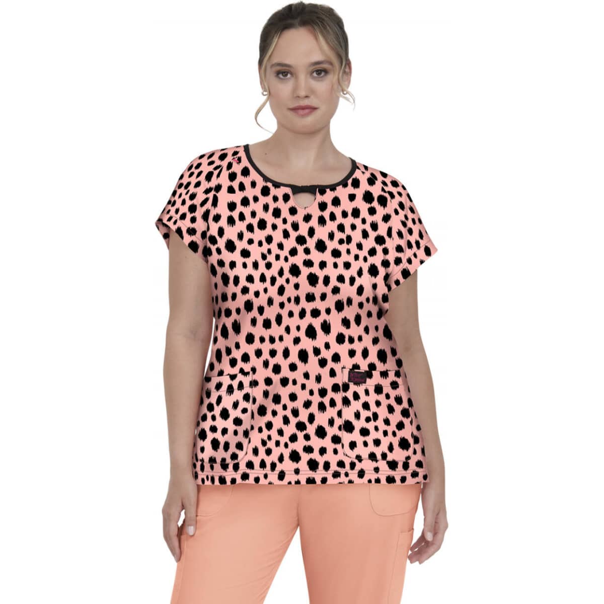 A leopard print top in peach and black, featuring a round neckline and short sleeves. Includes a pocket.