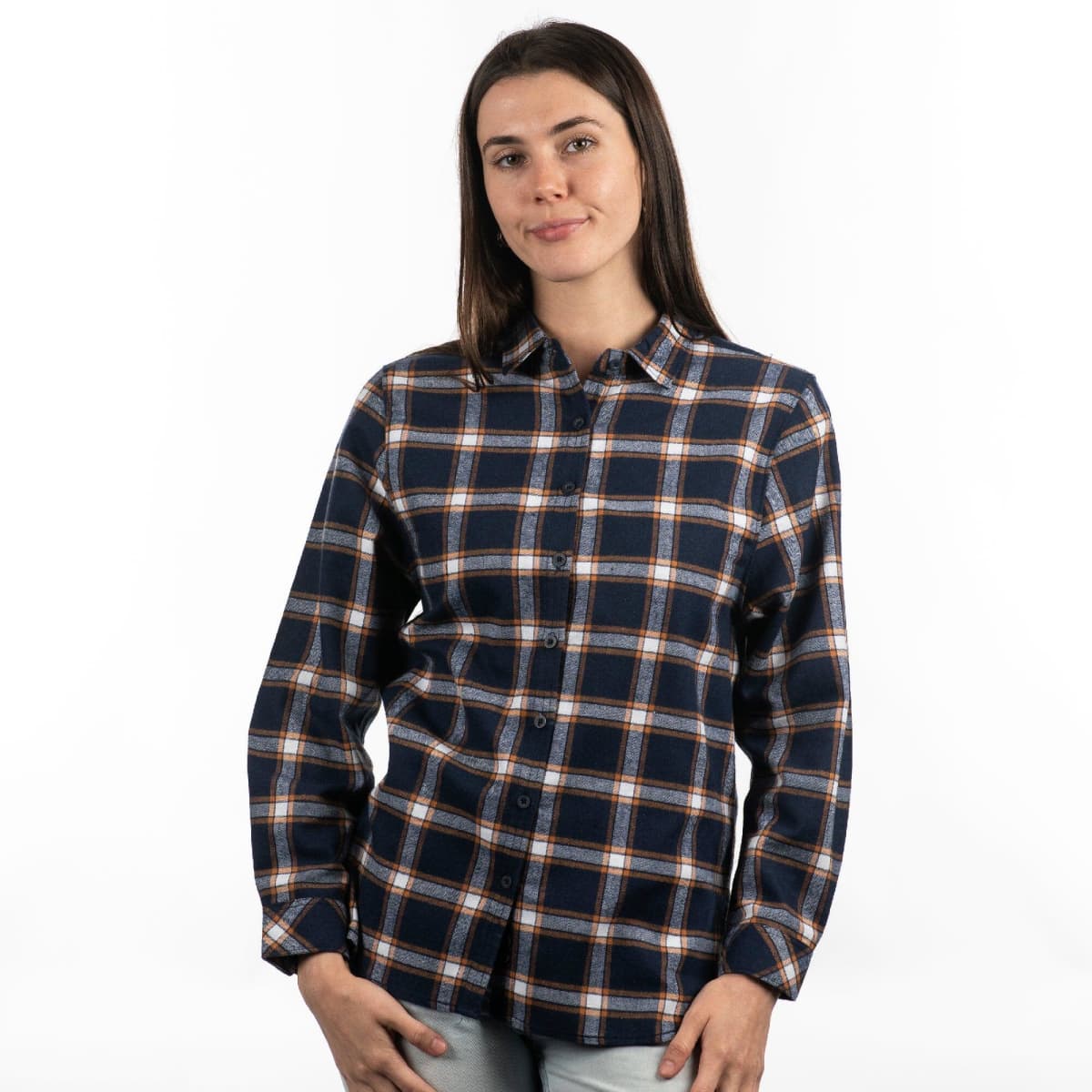A model poses in a red and black plaid flannel button-up shirt with rolled sleeves. The shirt features a logo.