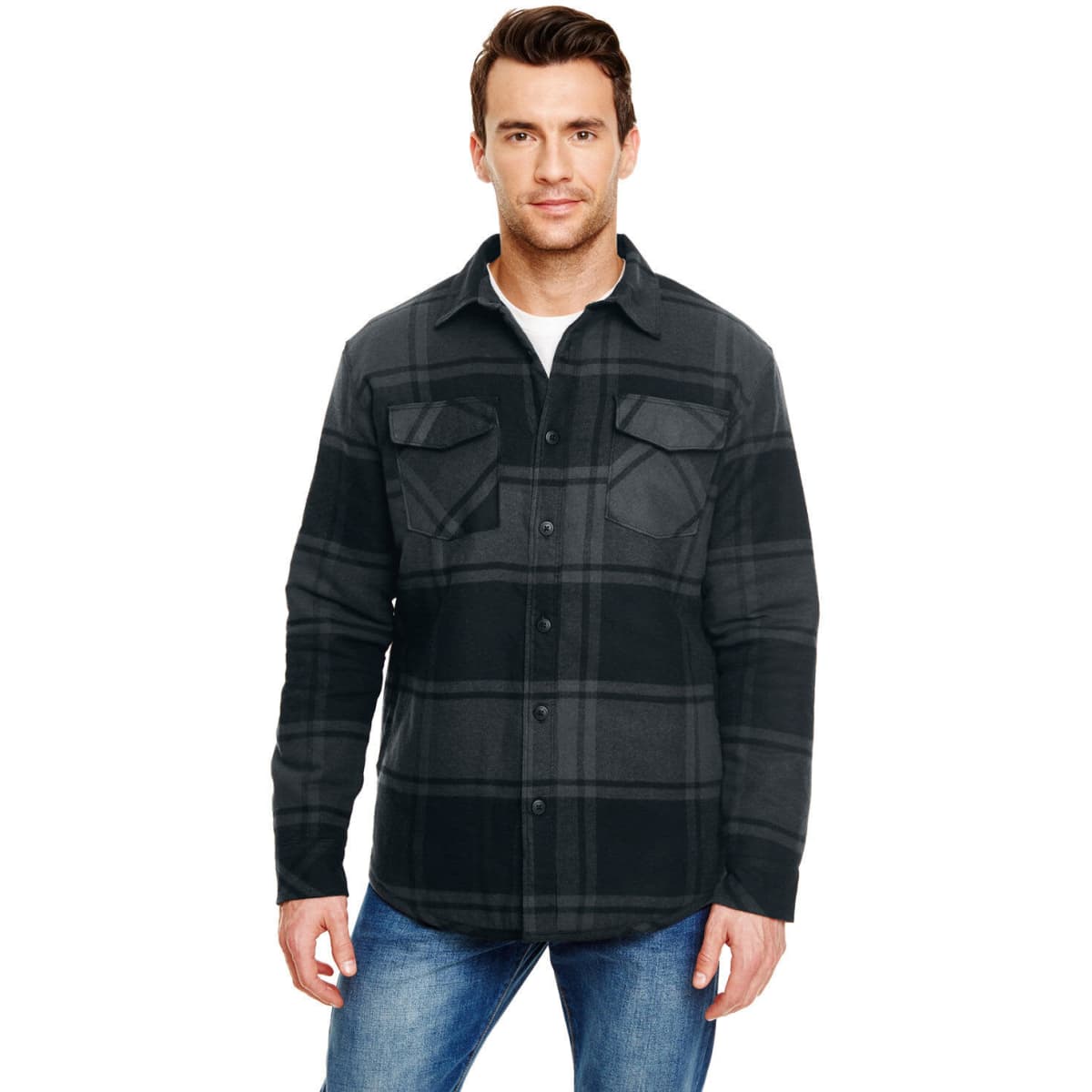 A flannel jacket in black and grey plaid with two chest pockets and a logo, worn by a man.