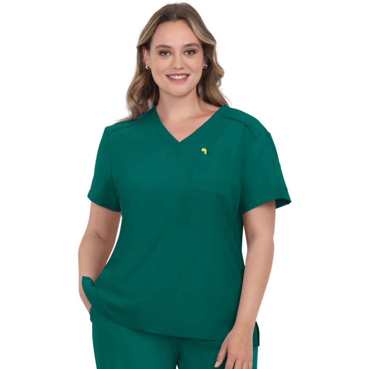 A green medical scrub top with a V-neck and short sleeves, featuring a small logo on the chest pocket.