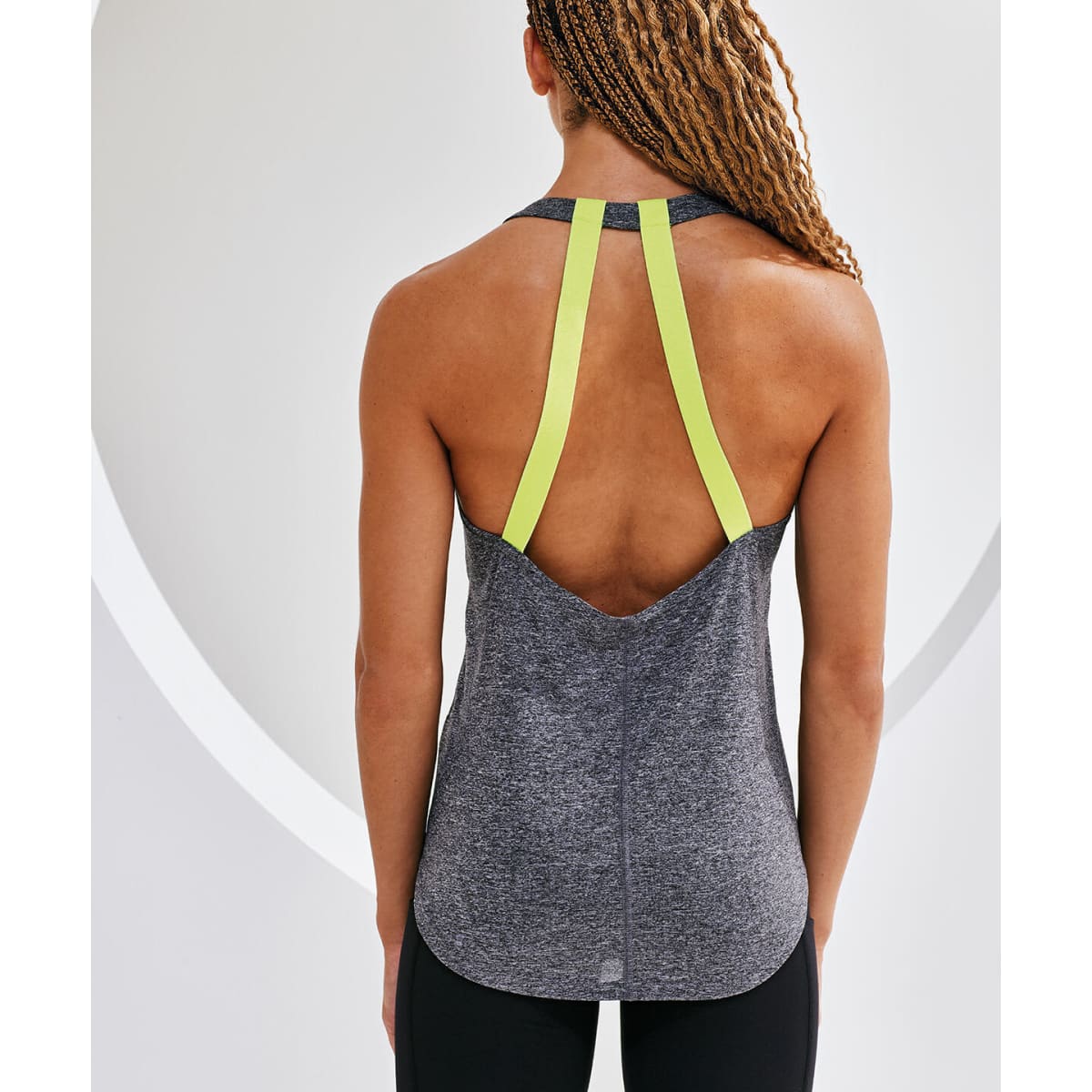 A grey double strap back vest with neon yellow straps, featuring a sporty design and a relaxed fit.