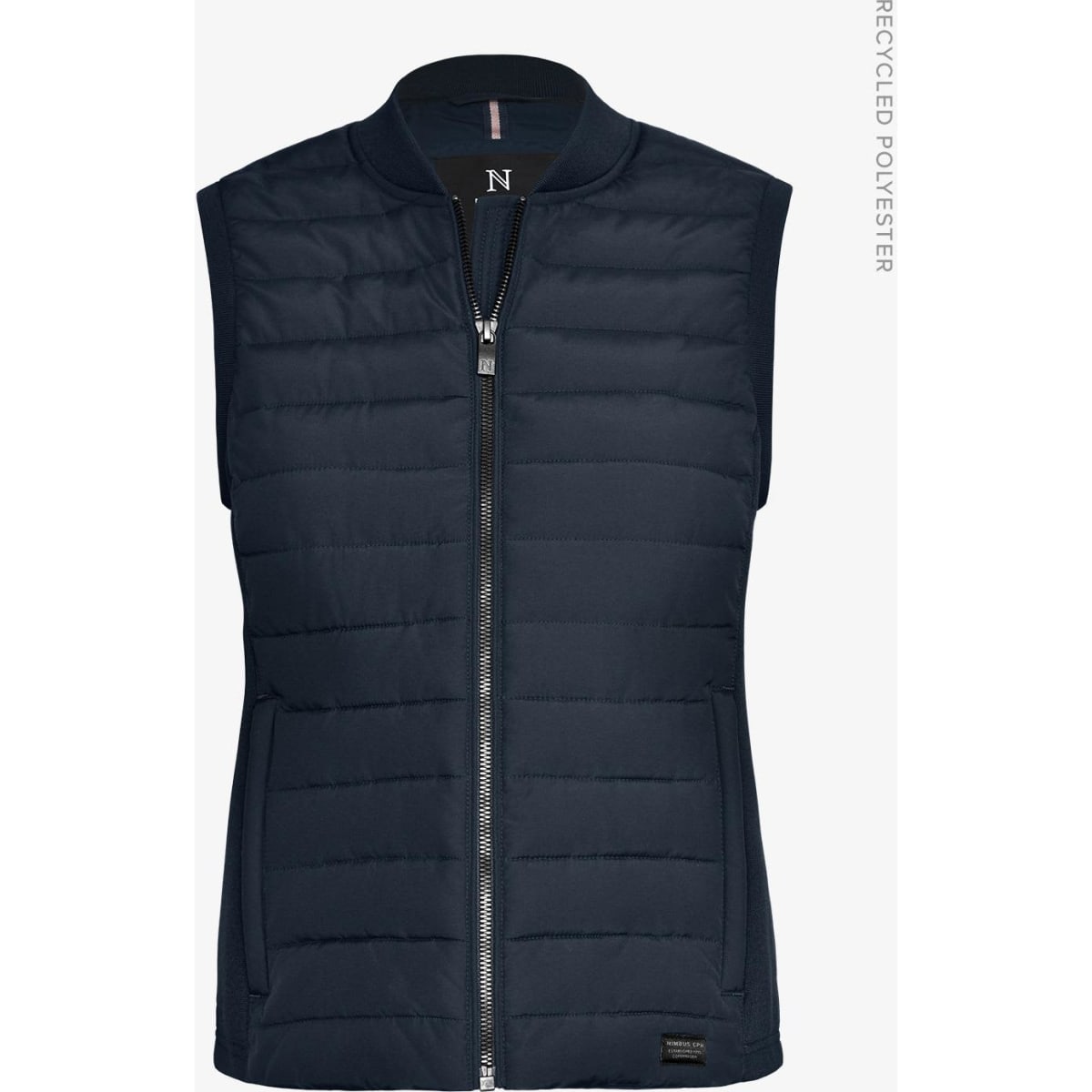 A navy women's vest featuring a zip front, padded design, and a logo on the side. Made from recycled polyester.