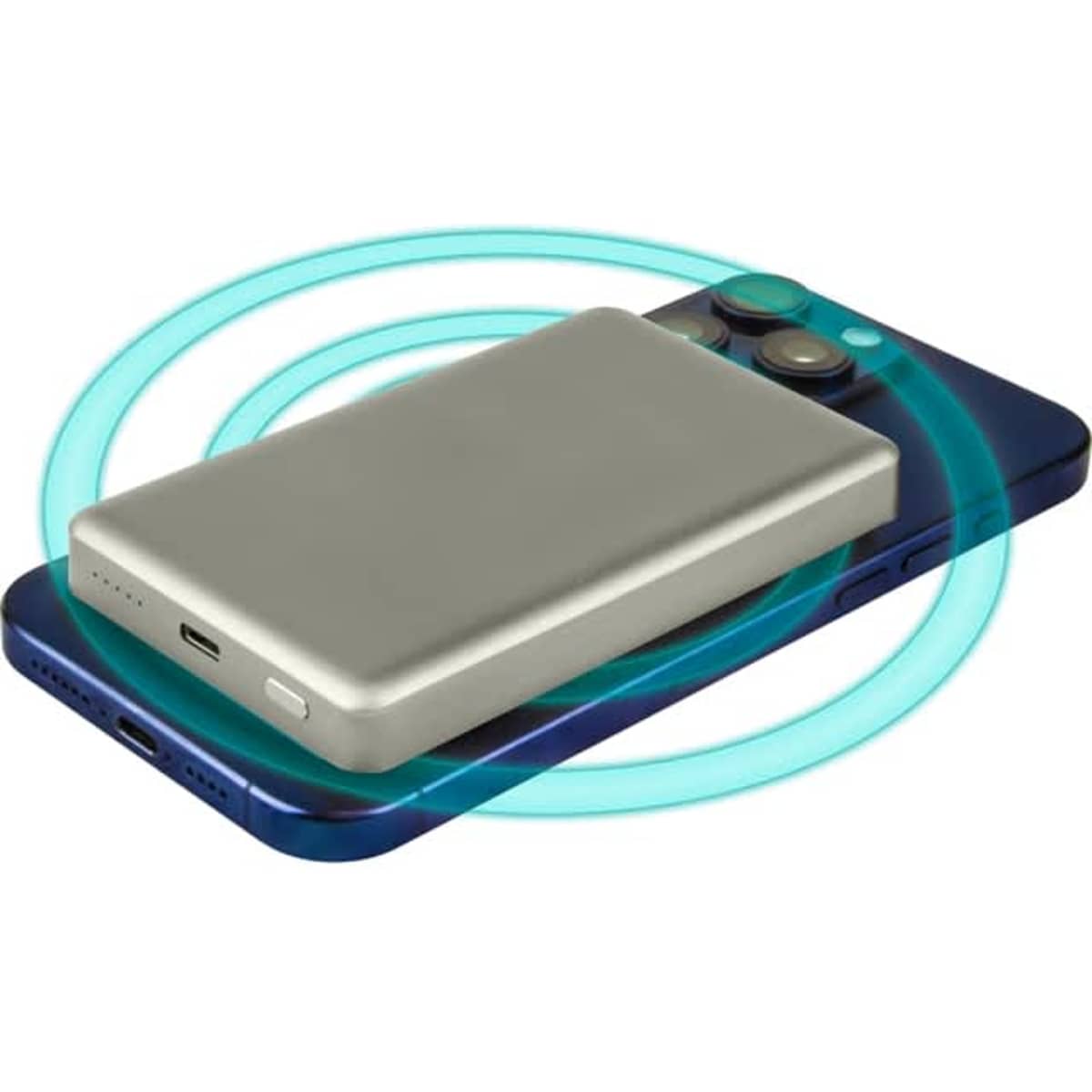 A silver 15W MagSafe wireless power bank placed on a blue smartphone, with a glowing ring indicating wireless charging.