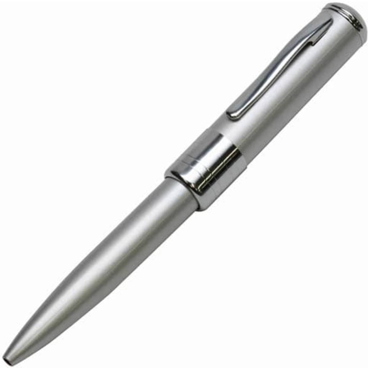 A silver metal pen with a sleek retro design, featuring a clip and a pointed tip, elevated for writing.