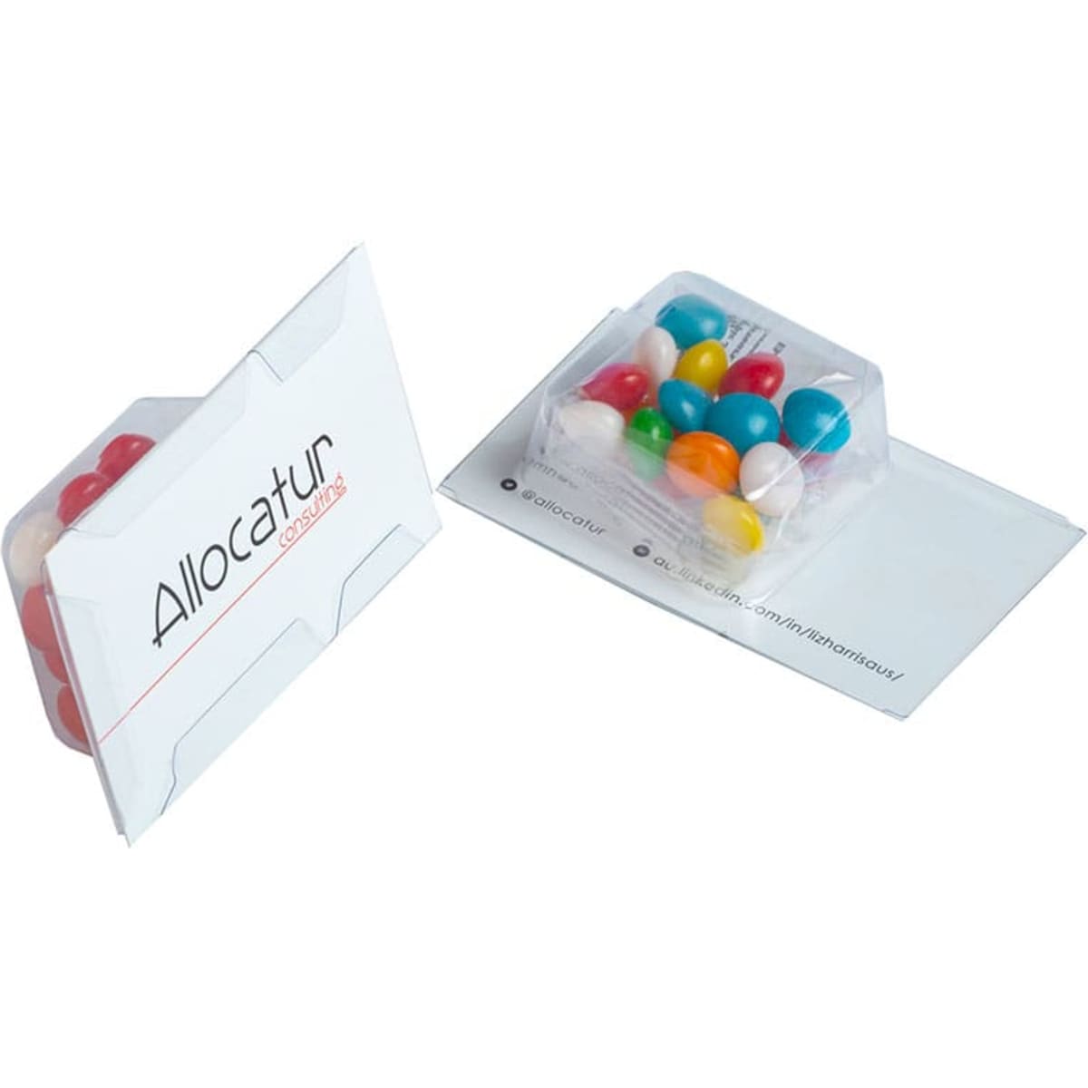 A promotional product featuring colourful chewy fruit sweets in a clear container, packaged in a white card holder with branding.