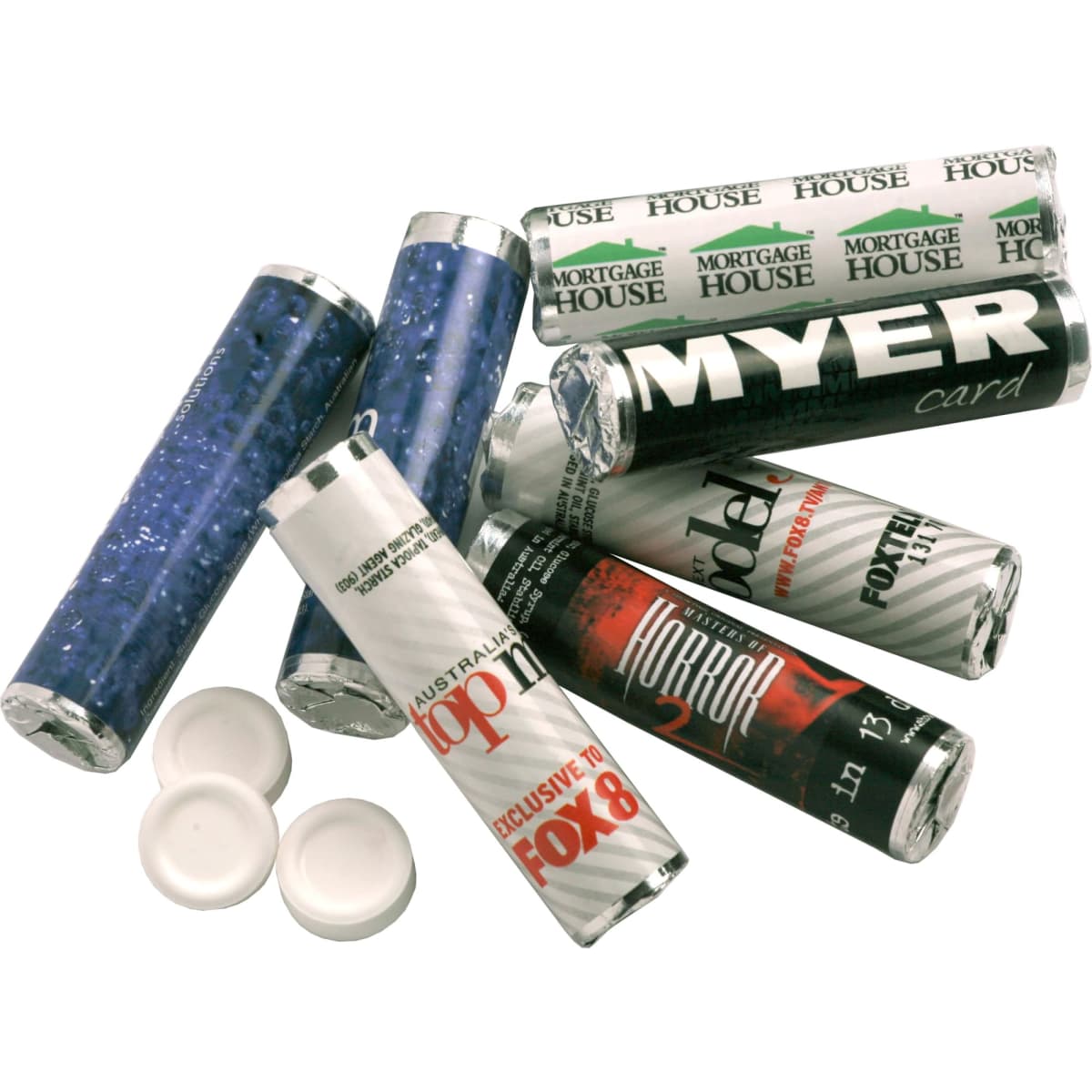A collection of branded mint rolls featuring various colours and designs, with several white caps beside them.