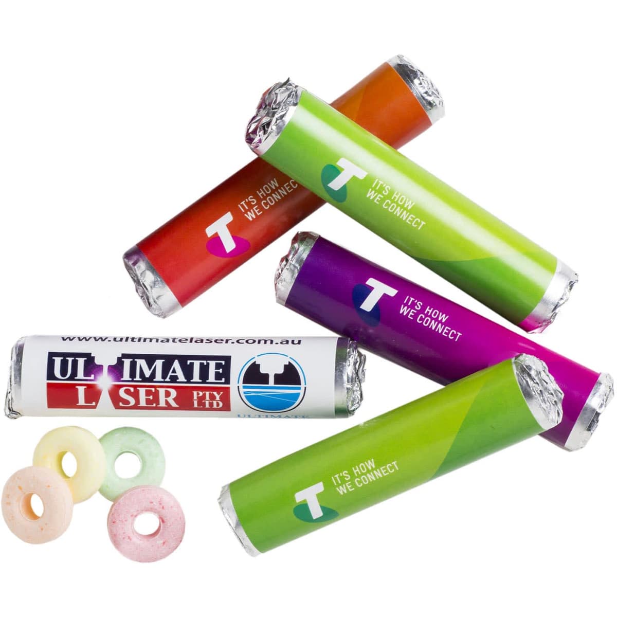 A selection of colourful mixed lollies wrapped in vibrant packaging, featuring one logo. Four lollies are visible in various shades.
