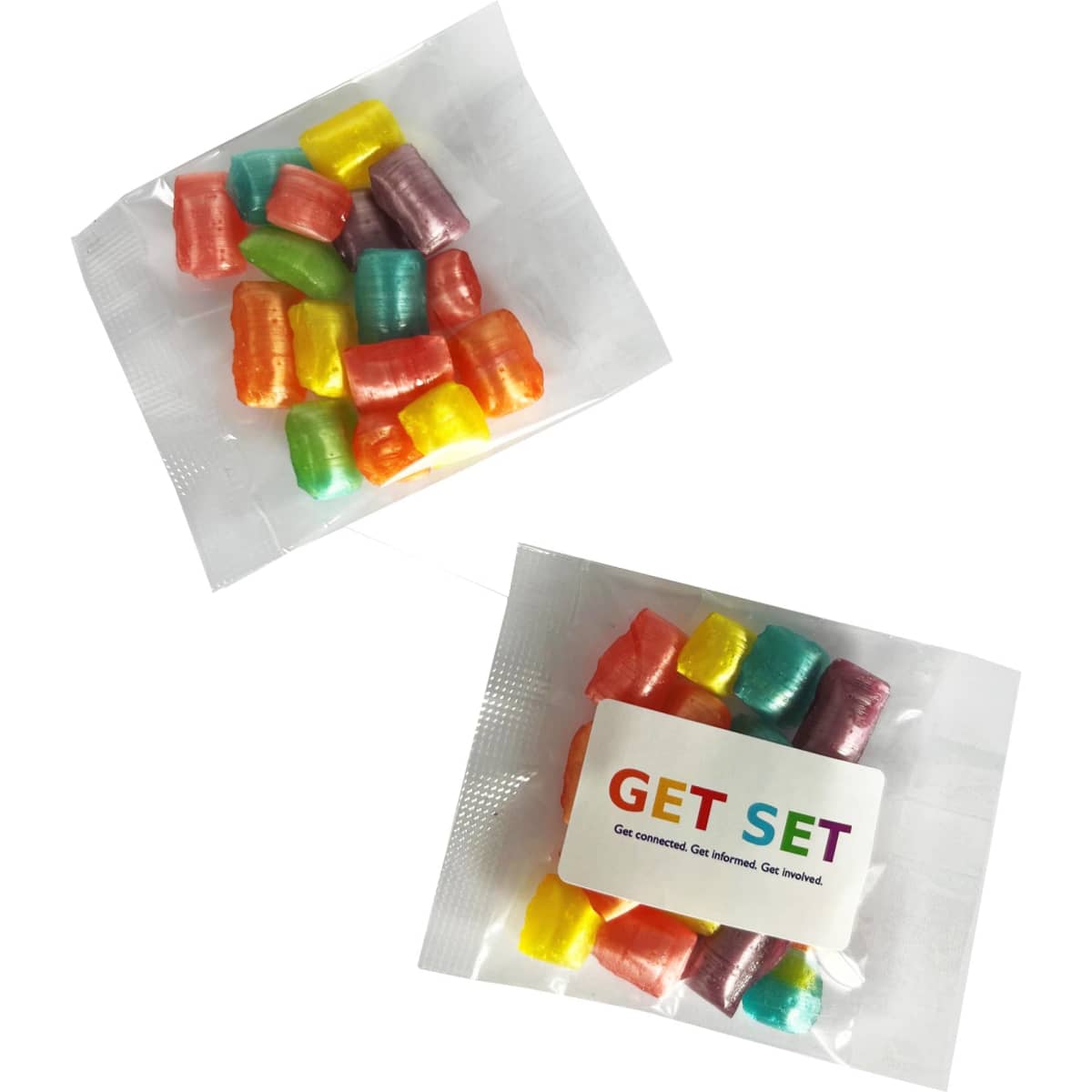A packet of colourful humbugs in various shades, including pink, yellow, green, and blue, with packaging and branding.