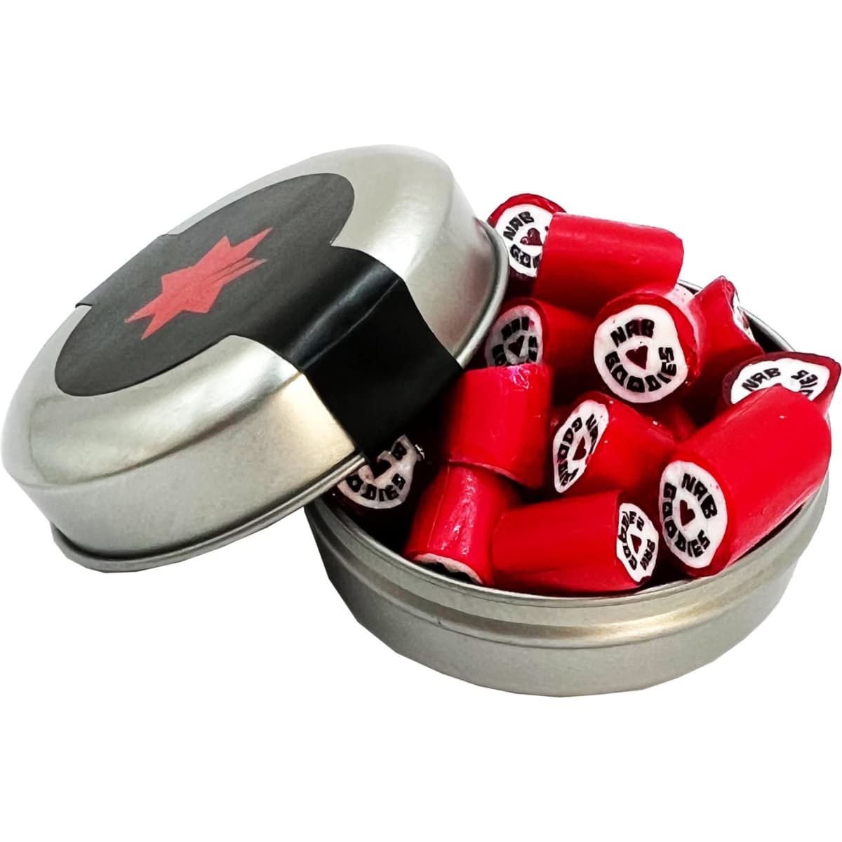 A silver tin filled with red rock candy pieces, some displaying black and white designs, with a black lid featuring a red star.