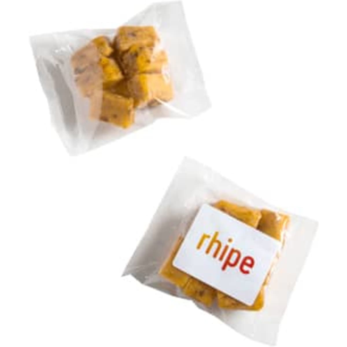 A pack of apricot bites featuring orange-yellow pieces in a clear wrapper, with a logo on the packaging.