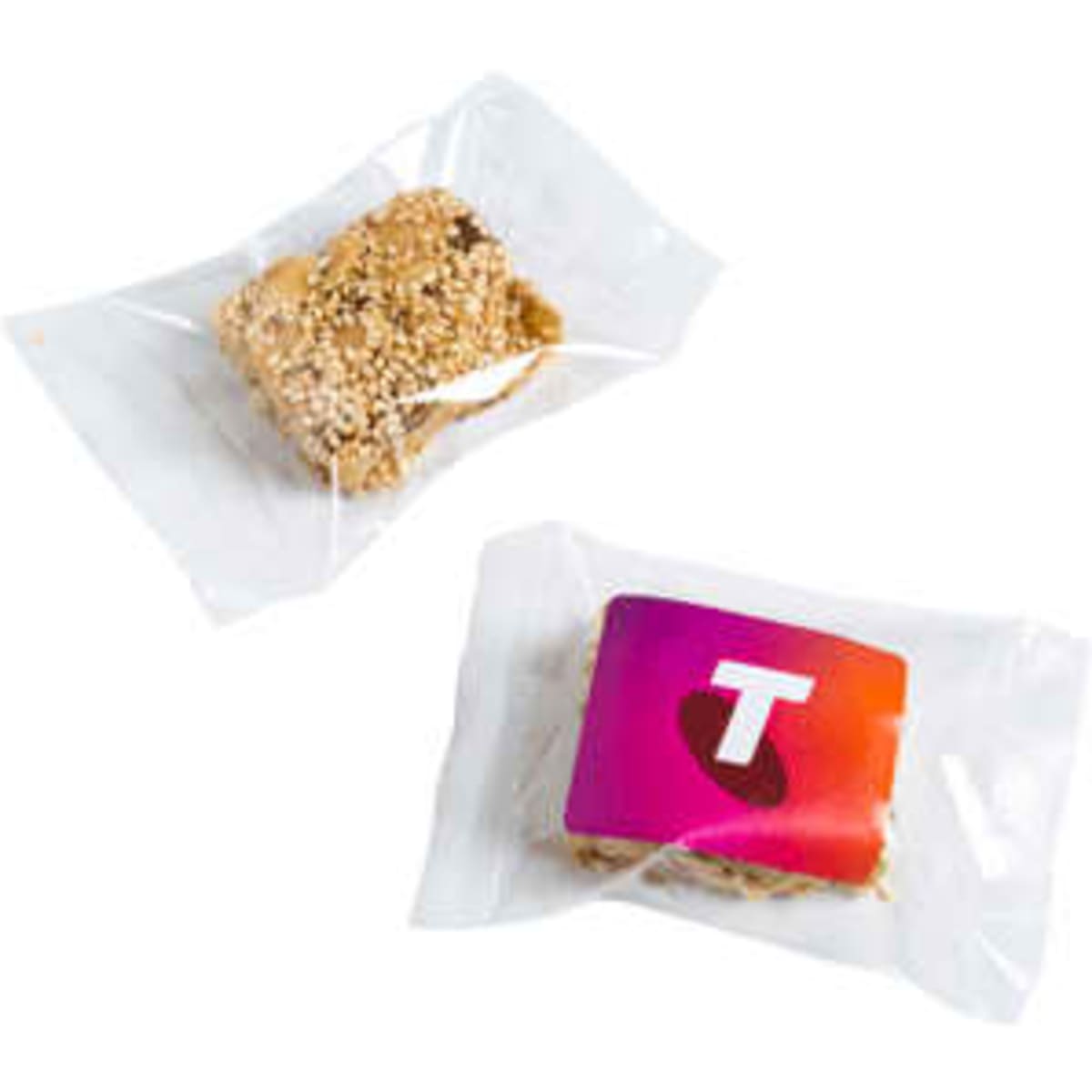 A sesame nut bar wrapped in clear packaging, featuring a golden-brown colour with a branded label.